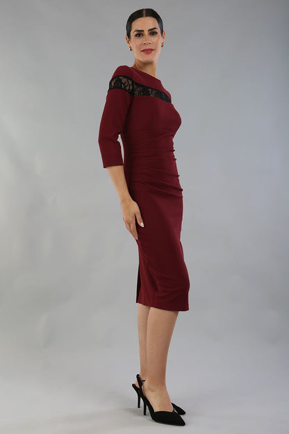 Model wearing the Diva Atlantis Pencil dress with three quarter length sleeves in cabaret burgundy and black front image