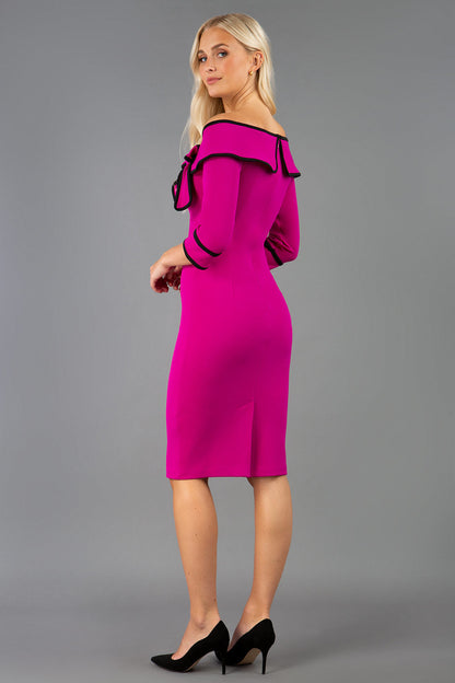 A Model is wearing an off shoulder three quarter sleeve pencil dress in pink by diva catwalk back image