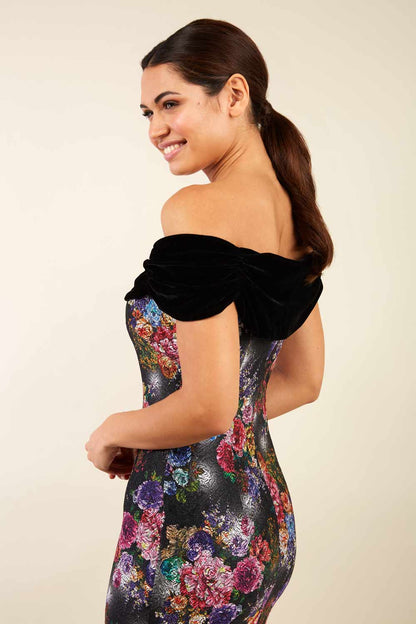 model wearing diva catwalk verdana matilda jaquard pencil-skirt fitted dress print and black velvet bardot neckline sleeveless and knee length (Black)