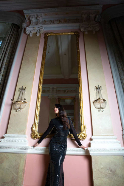 Blonde Model wearing a long full length metallic sparkle dress by Diva Catwalk front