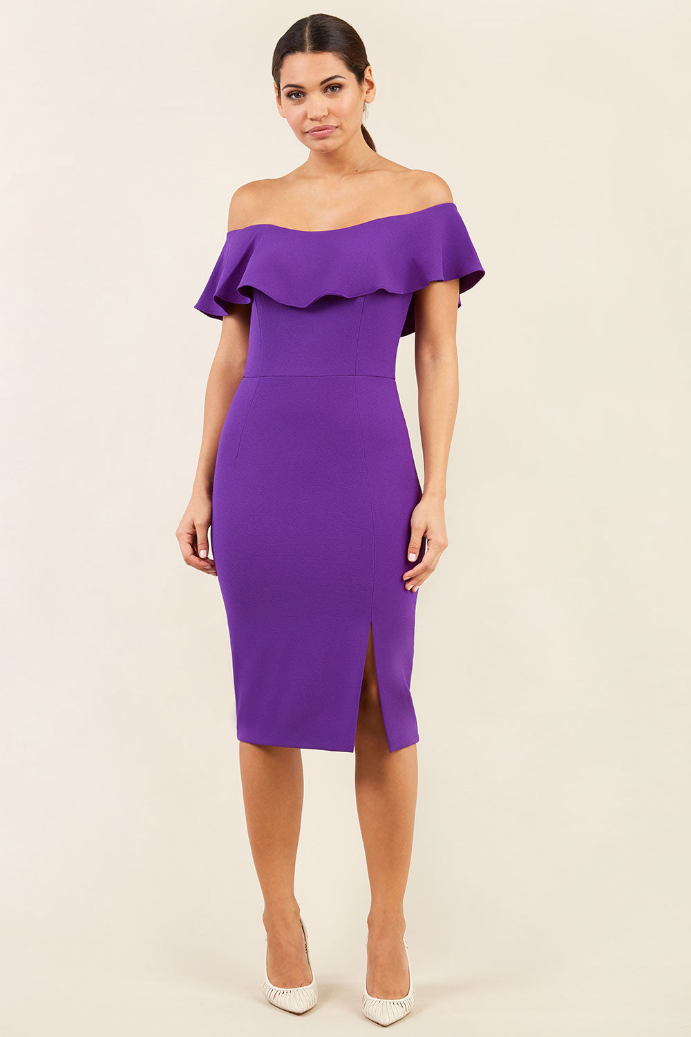 brunette model wearing diva catwalk pencil dress with off shoulder frilled front and bardot neckline in passion purple colour back (Passion Purple)