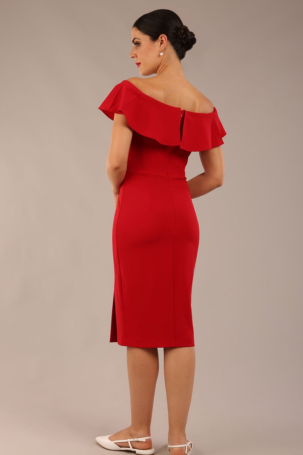brunette model wearing diva catwalk pencil dress with off shoulder frilled front and bardot neckline in passion red  colour back (Passion Red)