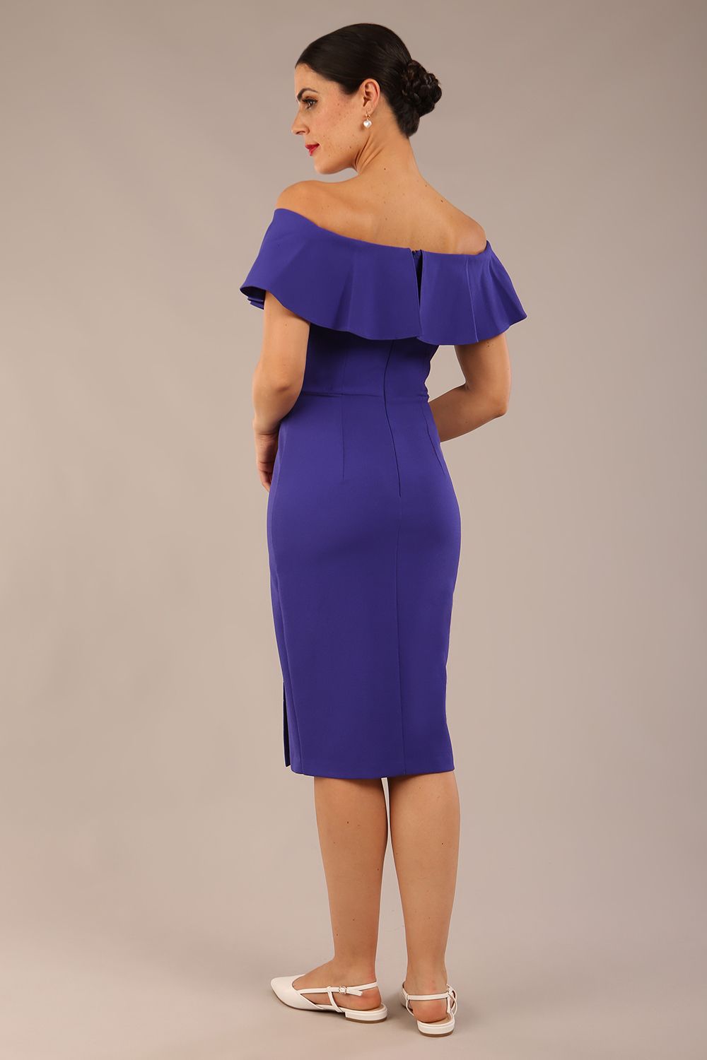 brunette model wearing diva catwalk pencil dress with off shoulder frilled front and bardot neckline in spectrum indigo  colour front (Spectrum Indigo)