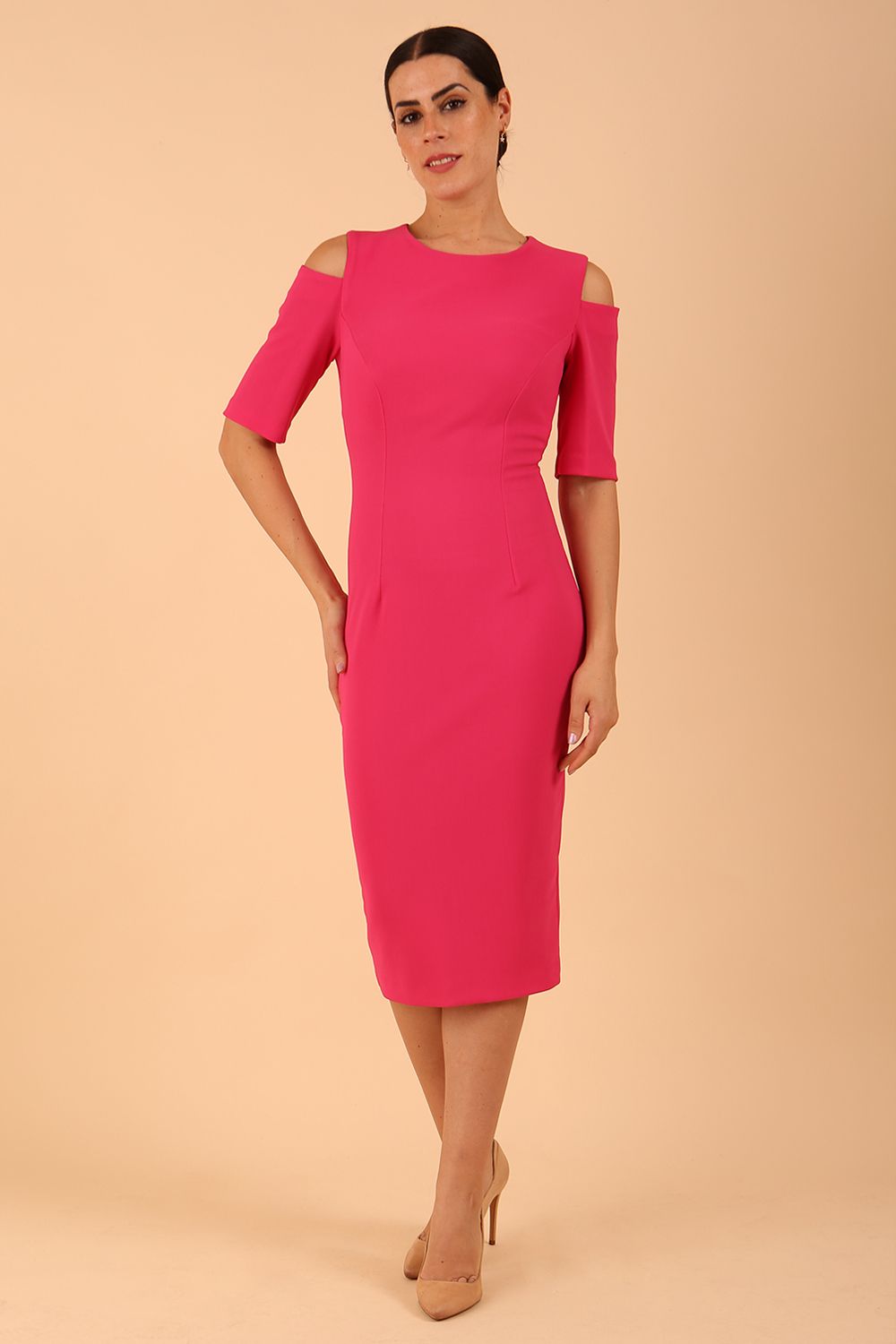model is wearing diva catwalk solway pencil dress cold shoulder detail and rounded neckline in Fuchsia Pink front