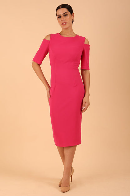 model is wearing diva catwalk solway pencil dress cold shoulder detail and rounded neckline in Fuchsia Pink front