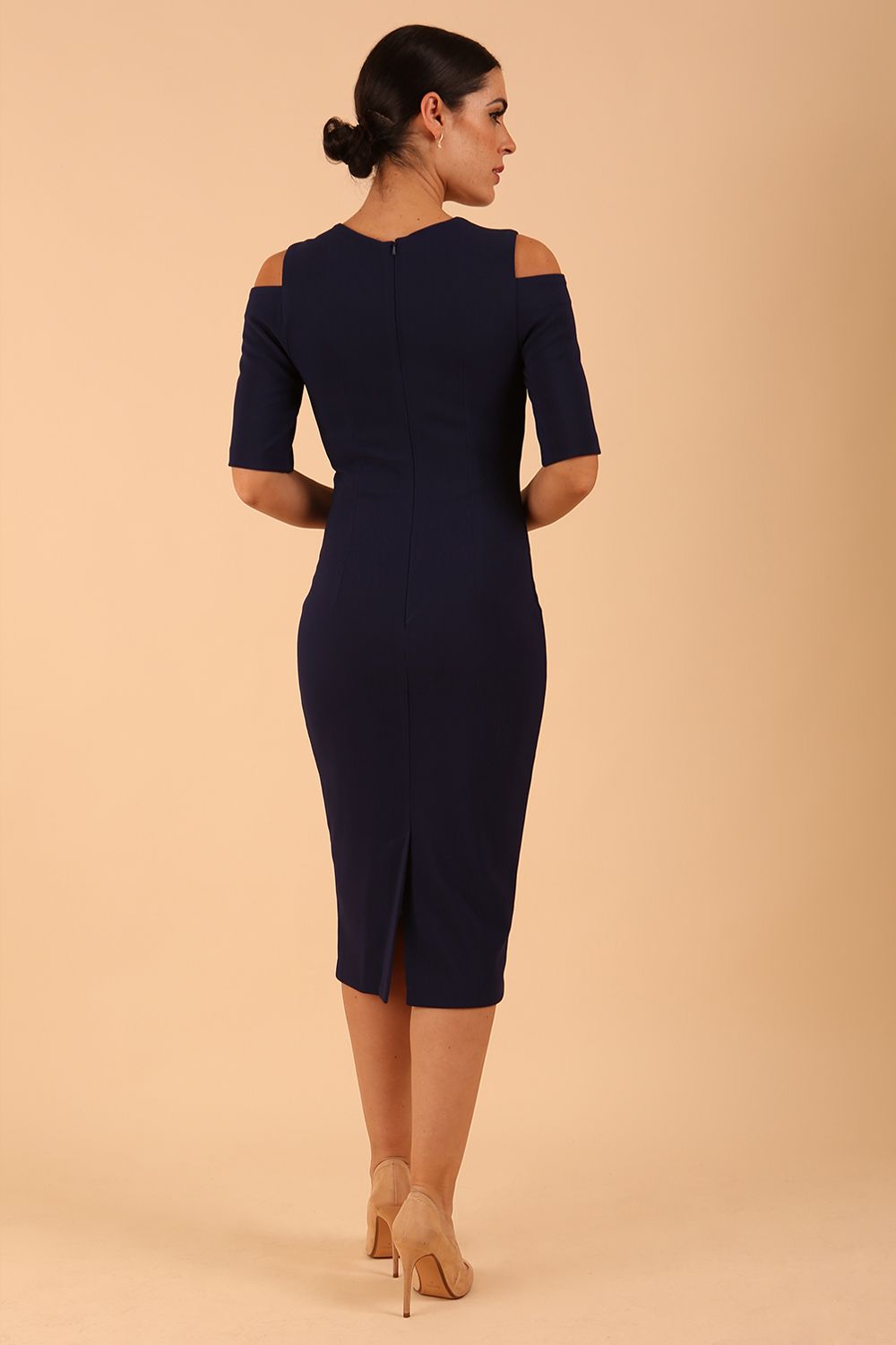 model is wearing diva catwalk solway pencil dress cold shoulder detail and rounded neckline in Navy Blue front side