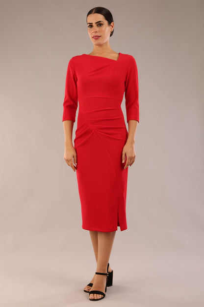 model is wearing a diva catwalk Amity Asymmetric Neckline Pleated front and back with 3/4 sleeves and front vent pencil Dress in True Red colour