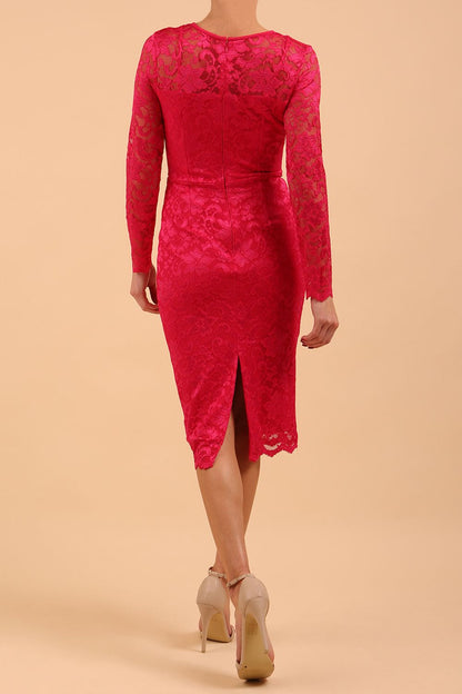 Model wearing a diva catwalk Montana Lace Dress with long lace sleeve and knee length with round lace neckline  in Yarrow Pink colour front side