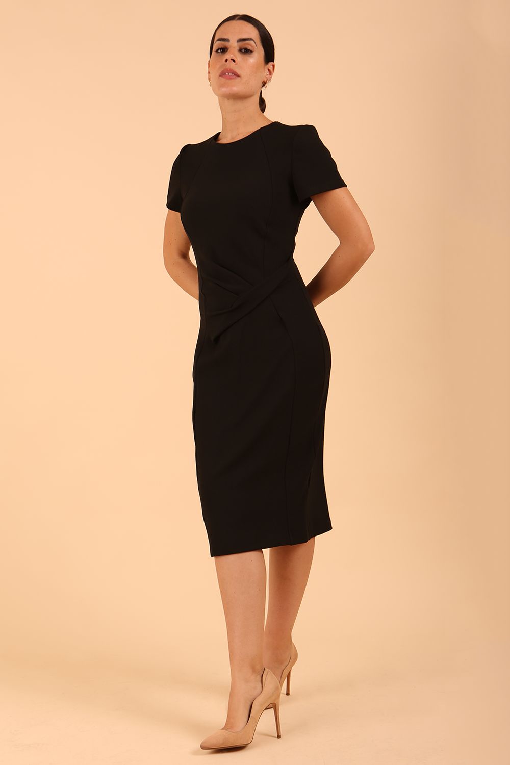model wearing a diva catwalk Stepford Pencil Dress short sleeves round neckline knee length in black colour 