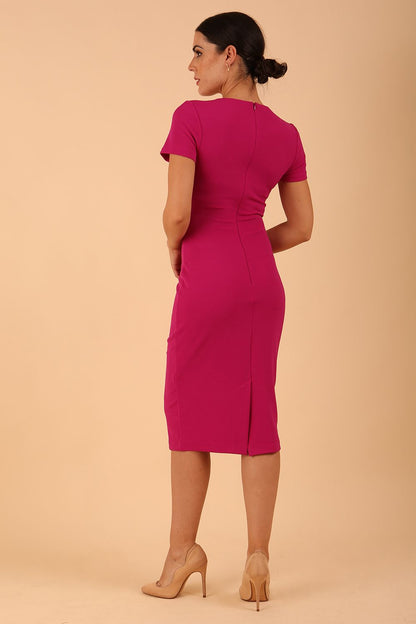 model wearing a diva catwalk Stepford Pencil Dress short sleeves round neckline knee length in magenta colour front