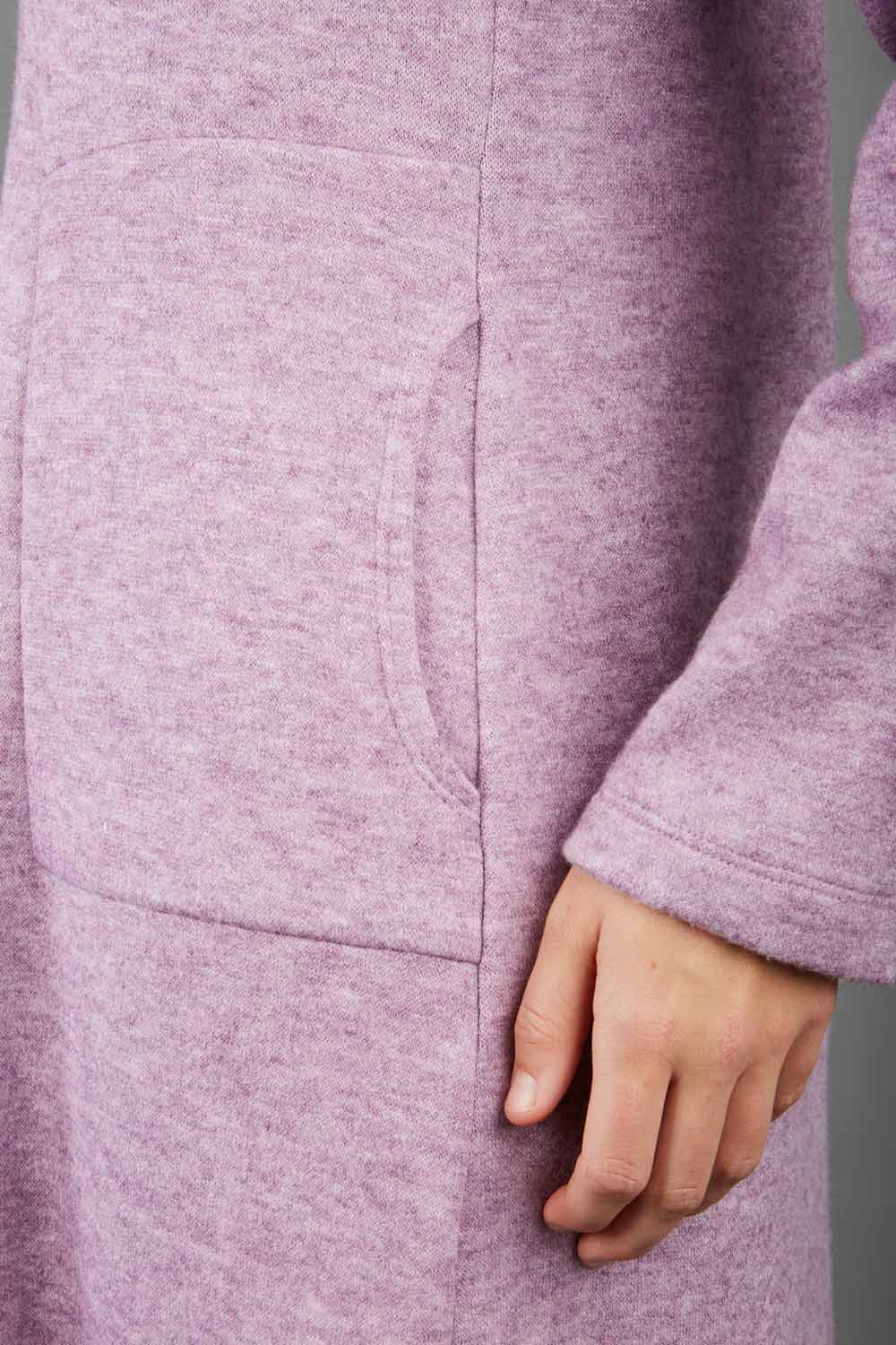 blonde model wearing diva catwalk irena cosy sleeved knee length dress with pockets and v-neckline in soft fabric pink front