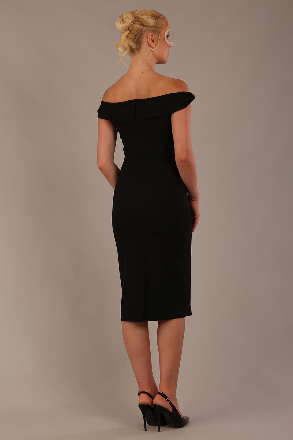 Model wearing the Diva Cloud Luxury Ripple Crepe cloud off-shoulder dress  design in black front image against a plain background