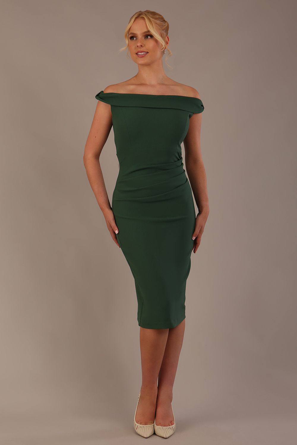 Model wearing the Diva Cloud Luxury Ripple Crepe cloud off-shoulder dress  design in hunter green front image against a plain background
