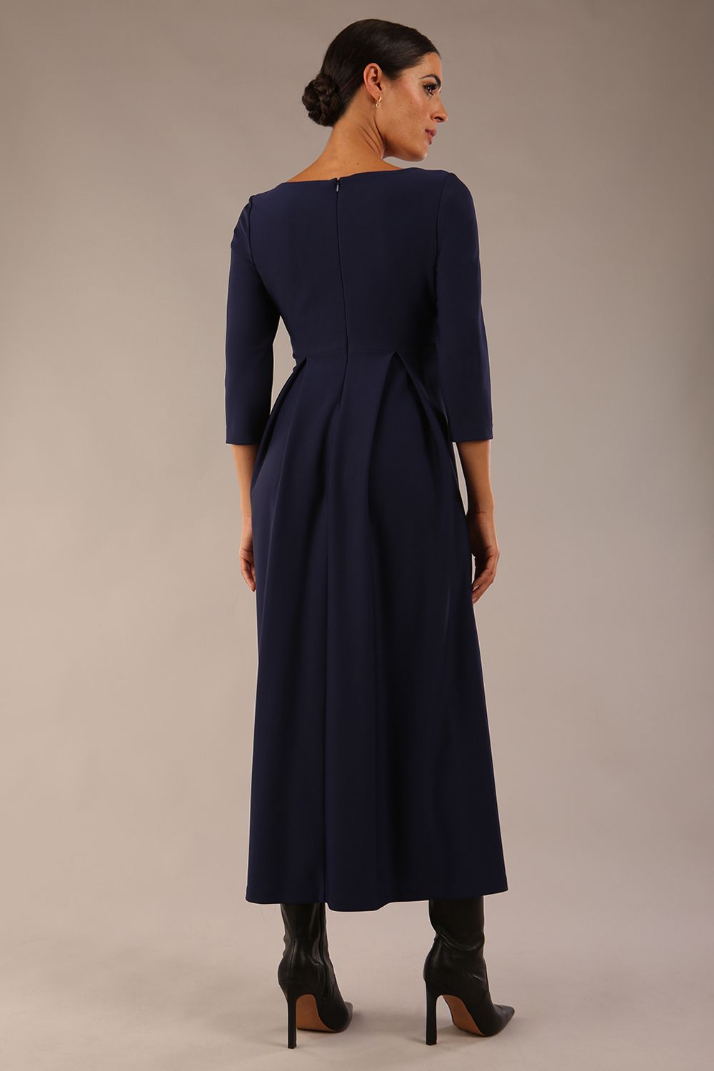 Brunette Model is wearing 3/4 sleeve sweetheart neckline swing navy blue dress (Navy Blue)