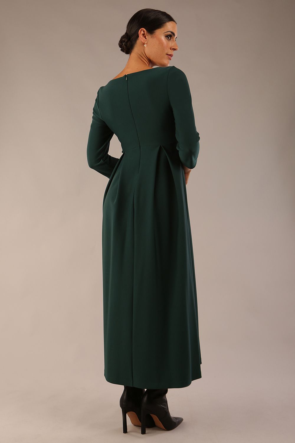 Brunette Model is wearing 3/4 sleeve sweetheart neckline swing forest green dress (Forest Green)