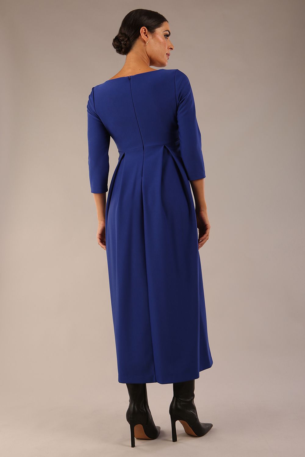 Brunette Model is wearing 3/4 sleeve sweetheart neckline swing cobalt blue dress (Cobalt Blue)