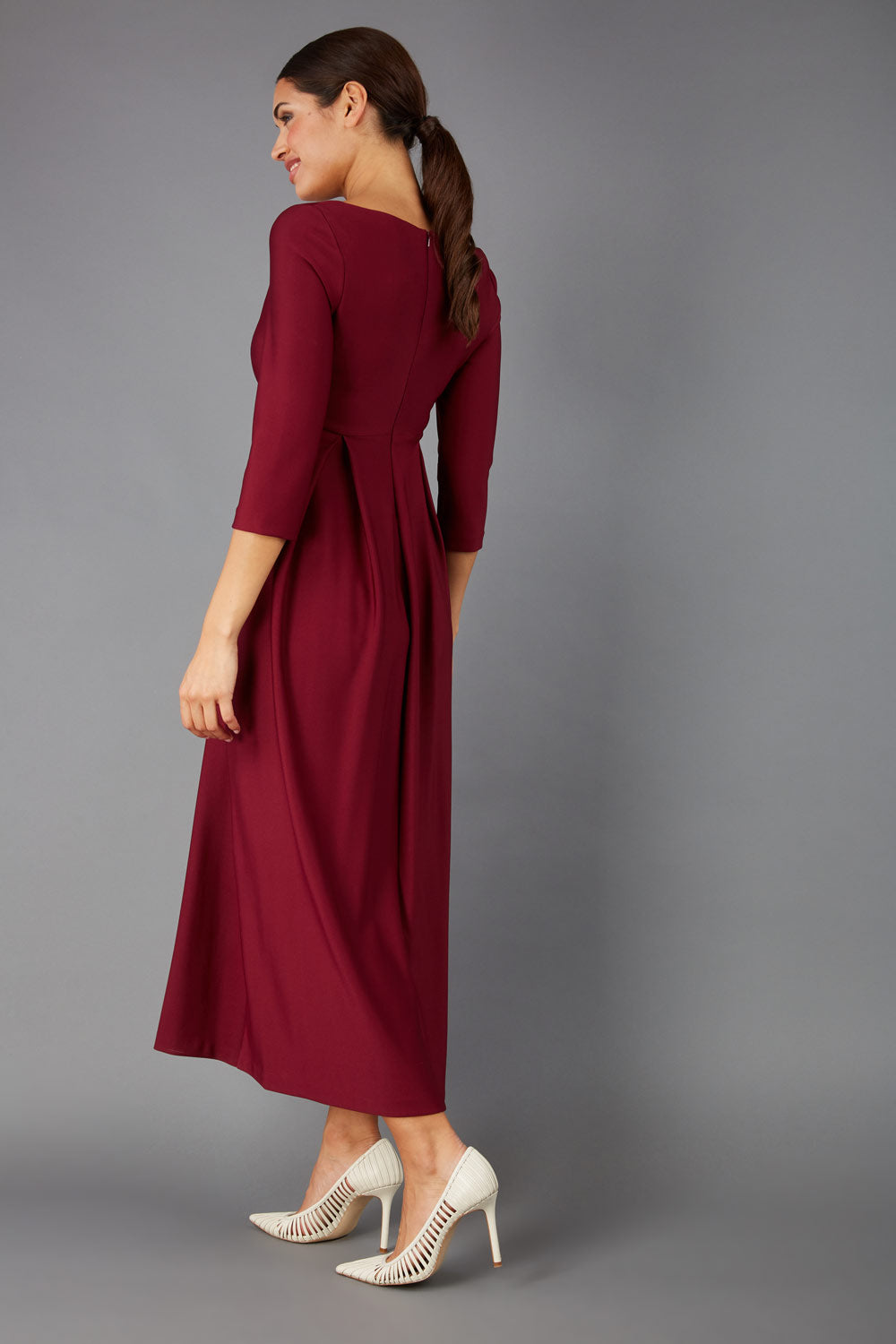 Brunette Model is wearing 3/4 sleeve sweetheart neckline  swing burgundy dress (Blissful Burgundy)