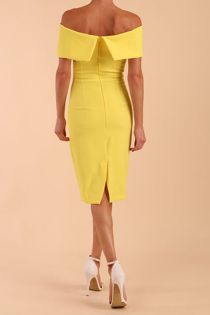 model is wearing diva catwalk mariposa pencil dress with Detailed Bardot neckline with fold-over detail and pleated at waist area in Blazing Yellow front side