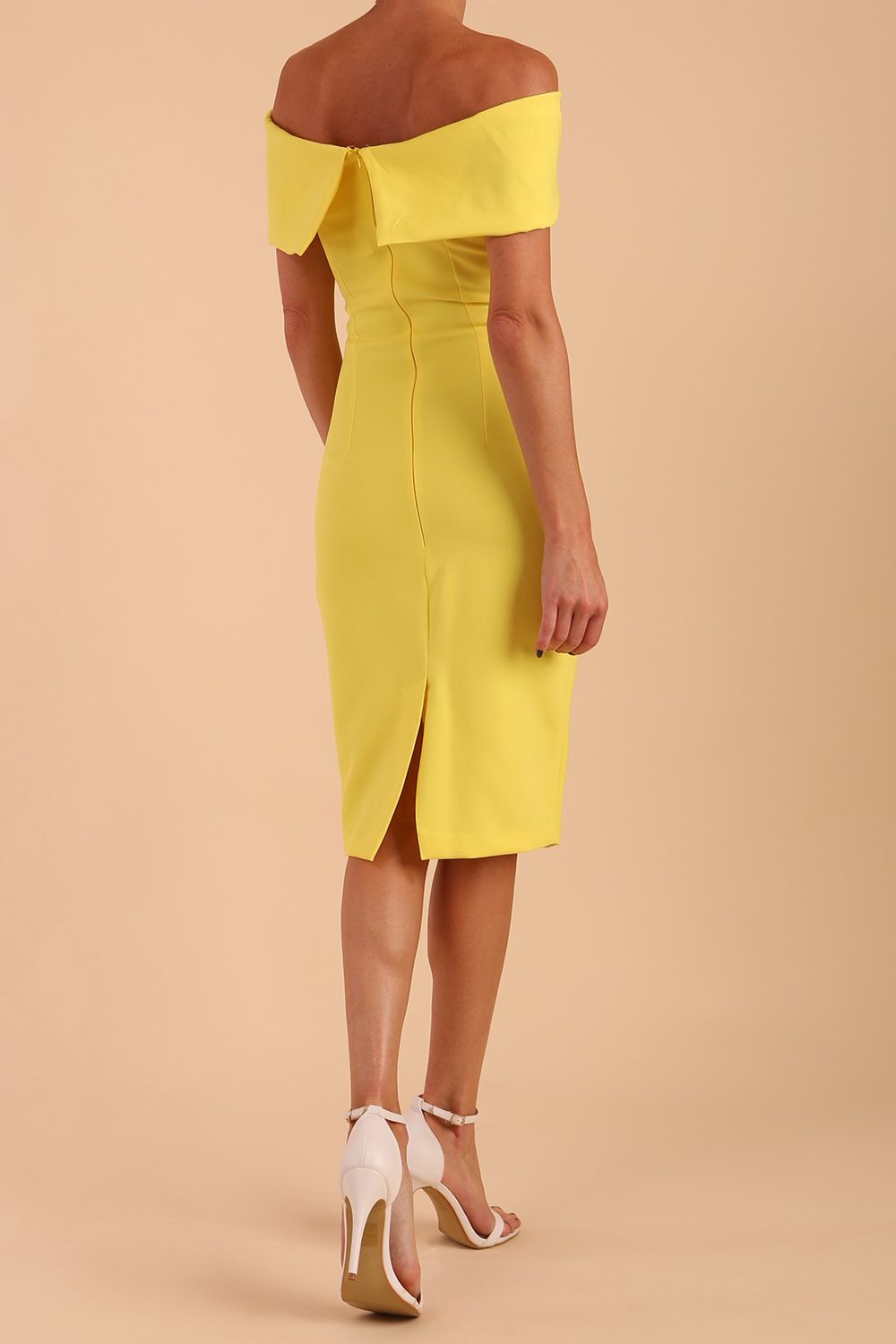 model is wearing diva catwalk mariposa pencil dress with Detailed Bardot neckline with fold-over detail and pleated at waist area in Blazing Yellow front side