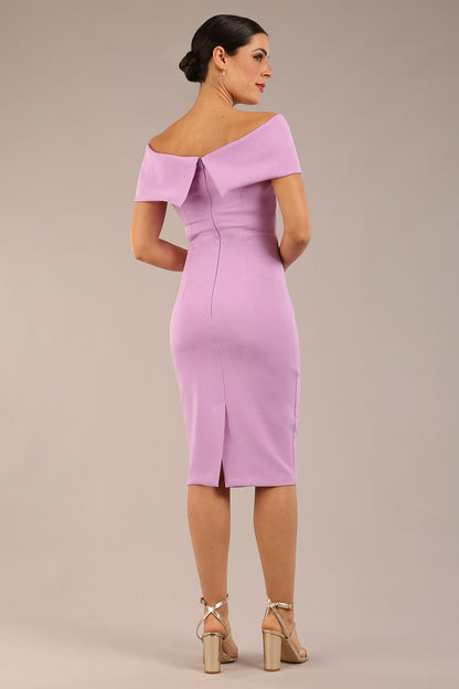 model is wearing diva catwalk mariposa pencil dress with Detailed Bardot neckline with fold-over detail and pleated at waist area in Sheer Lilac