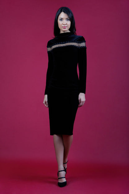 blonde model wearing diva catwalk black pencil dress called trocadero pencil midaxi style with funnel neckline and lace detail and long sleeves front
