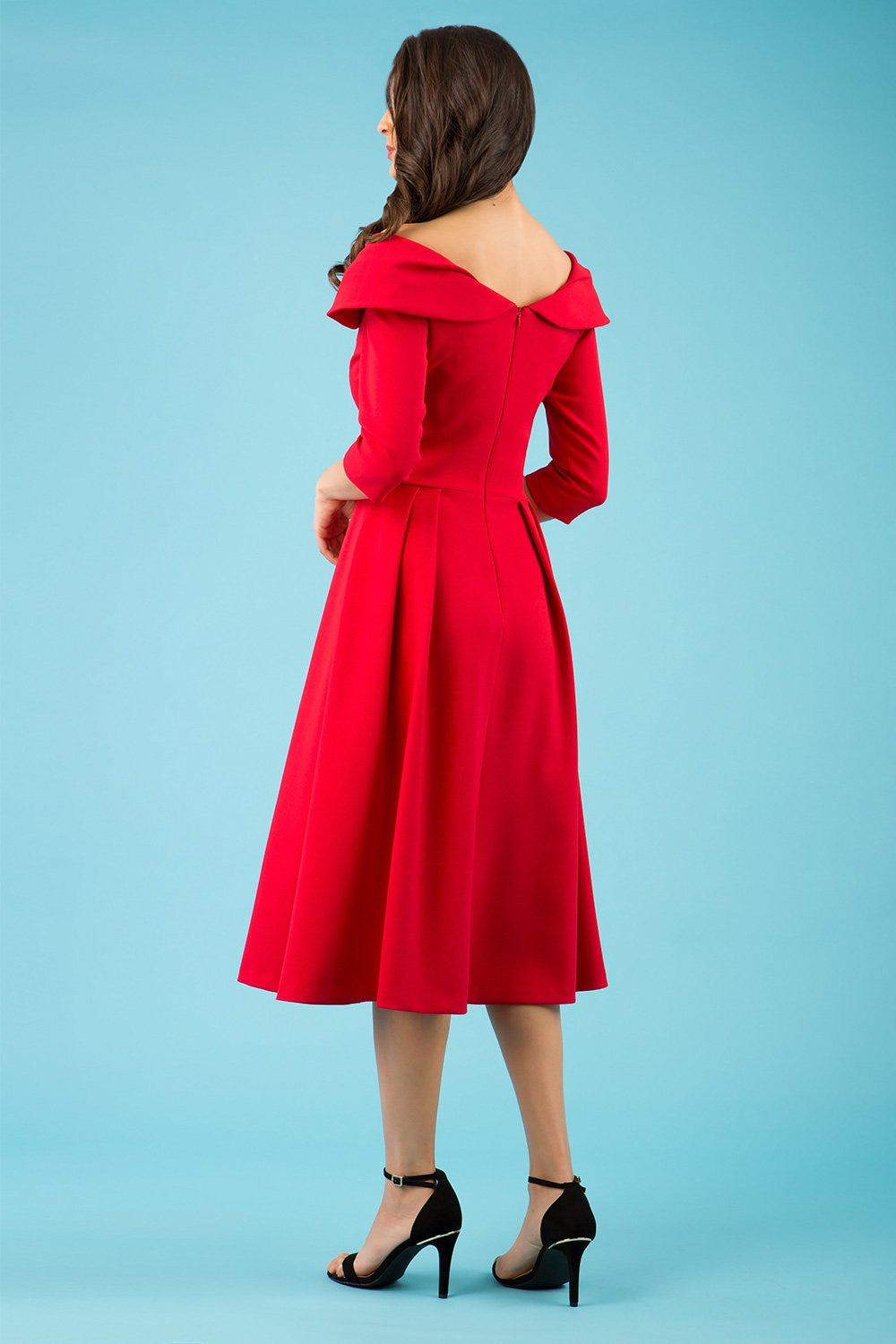 Model wearing Diva Catwalk Chesterton Sleeved dress with oversized collar detail and a-line swing pleated skirt in colour red front