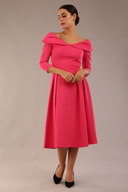 Model wearing Diva Catwalk Chesterton Sleeved dress with oversized collar detail and a-line swing pleated skirt in colour fuchsia pink front