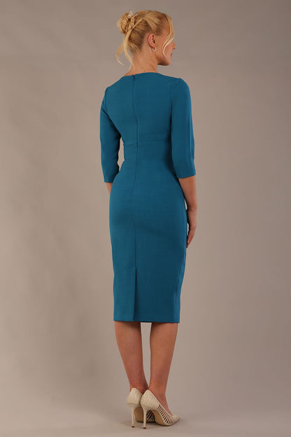 model wearing diva catwalk ubrique pencil dress with a keyhole detail and sleeves in teal colour front (Teal)
