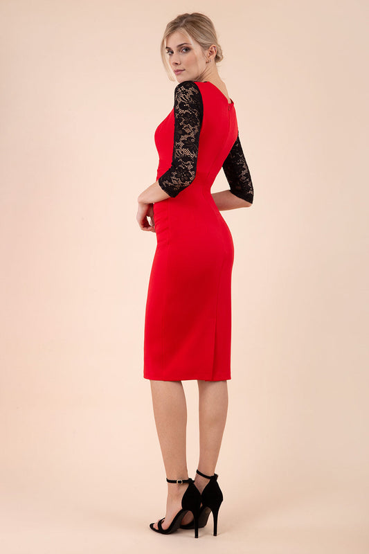 blonde model wearing diva catwalk haversham three quarter contrast pencil dress with lace detail across arms and neckline with pleating cross body in red and black front