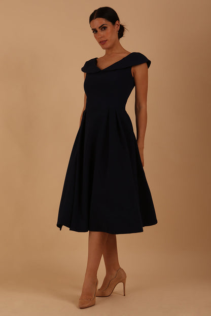 model is wearing divacatwalk Chesterton Sleeveless a-line swing dress in Navy Blue with oversized collar front