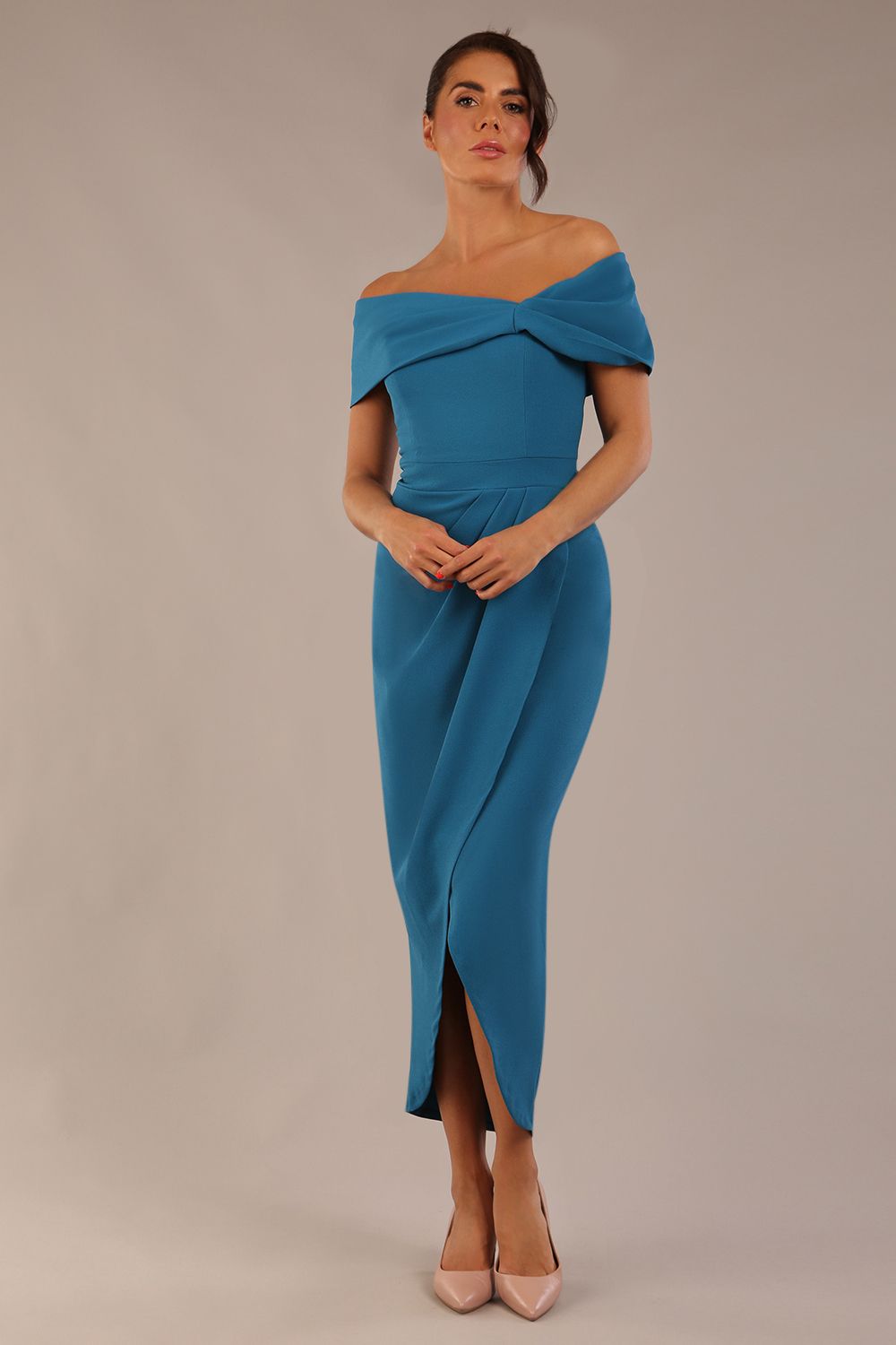 model wearing diva catwalk vegas calf length Teal midaxi dress with wide bardot neckline and open shoulders with a large opening at the front of the skirt with pleating coming down long skirt front (Tropical Teal)