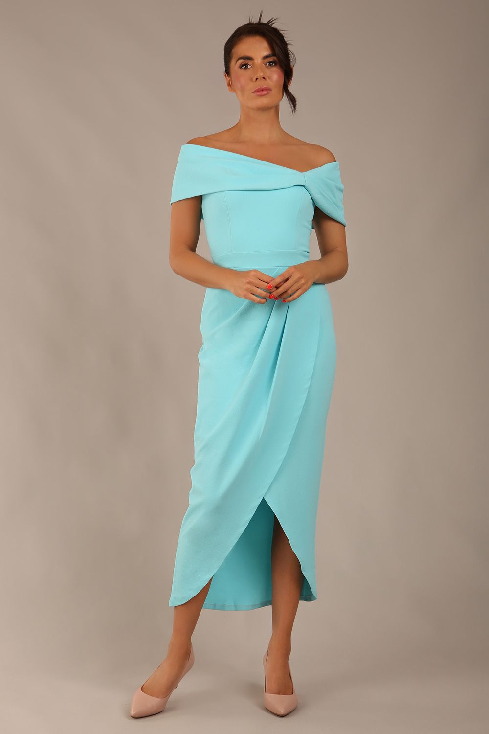 brunette model wearing diva catwalk vegas calf length turquoise midaxi dress with wide bardot neckline and open shoulders with a large opening at the front of the skirt with pleating coming down long skirt front (Turquoise)