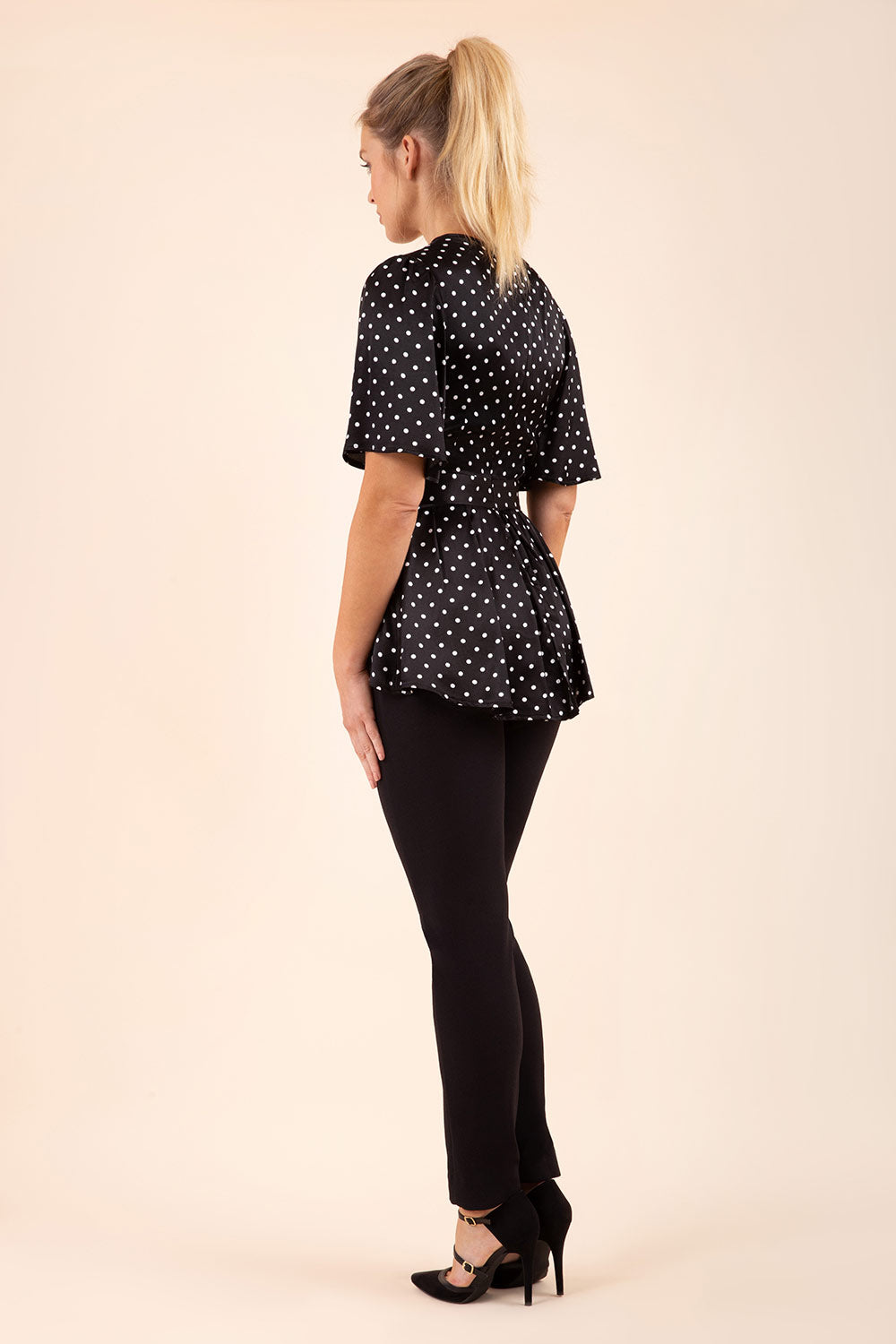 blonde model wearing diva catwalk straight ankle length trousers in black front