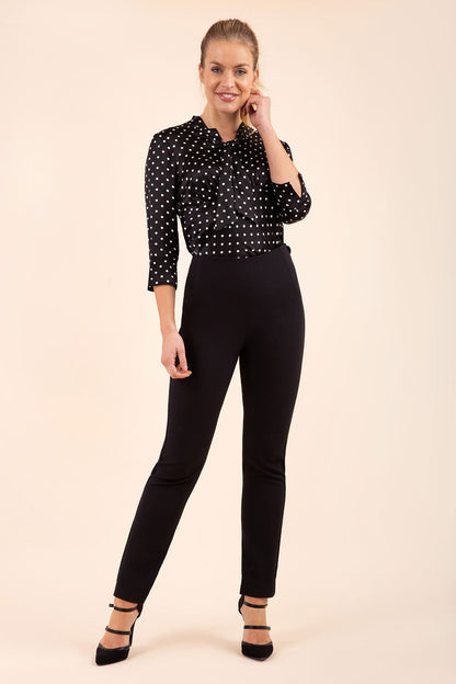 blonde model wearing diva catwalk straight ankle length trousers in black front
