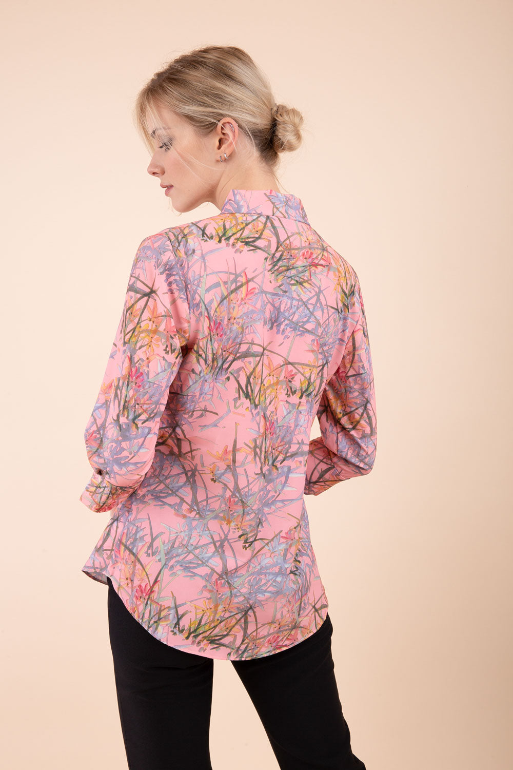 Model wearing the Diva floral top in pink front image