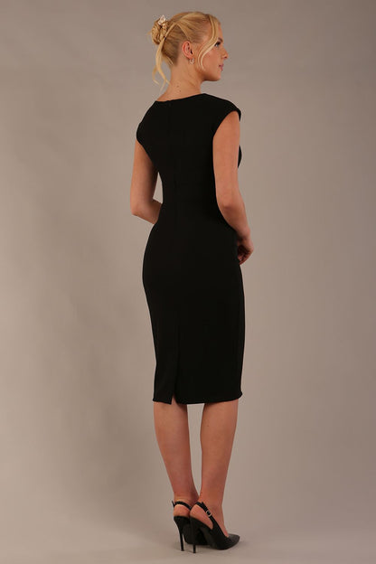 brunette model wearing diva catwalk lydia sleeveless pencil flattering fitted plain dress with split neckline and pleating across the body black front (Black)