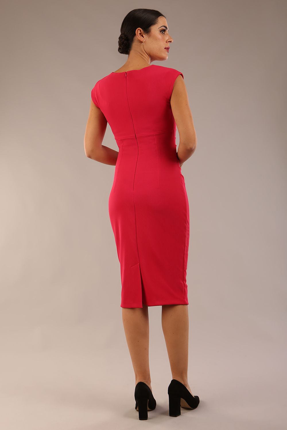 model wearing diva catwalk lydia sleeveless pencil flattering fitted plain dress with split neckline and pleating across the body Raspberry pink front (Raspberry Pink)