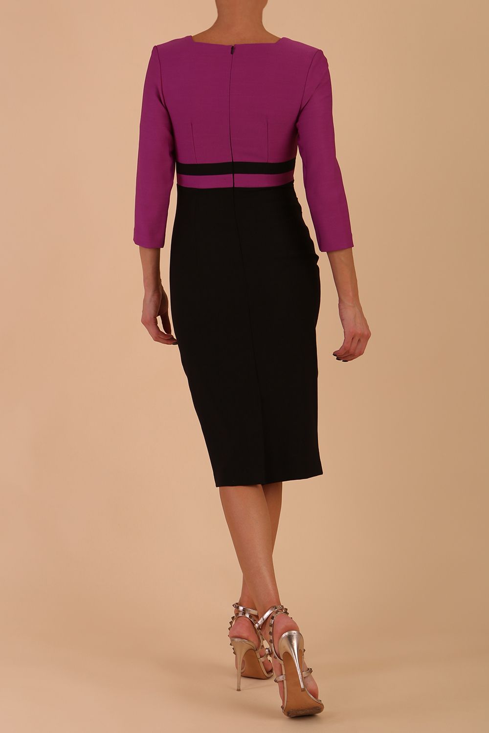 A model is wearing a three quarter sleeve colour block pencil dress by Diva Catwalk in Black and Dawn Purple colour