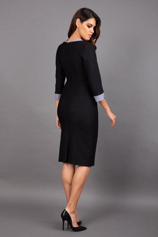 Model wearing Diva catwalk Cirrus figure fitted pencil dress in black/steel grey, three quarter sleeve back image