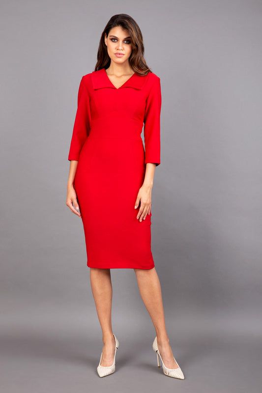 Model wearing Diva catwalk Pieris pencil dress in cardinal red with three quarter sleeve figure fitted front image