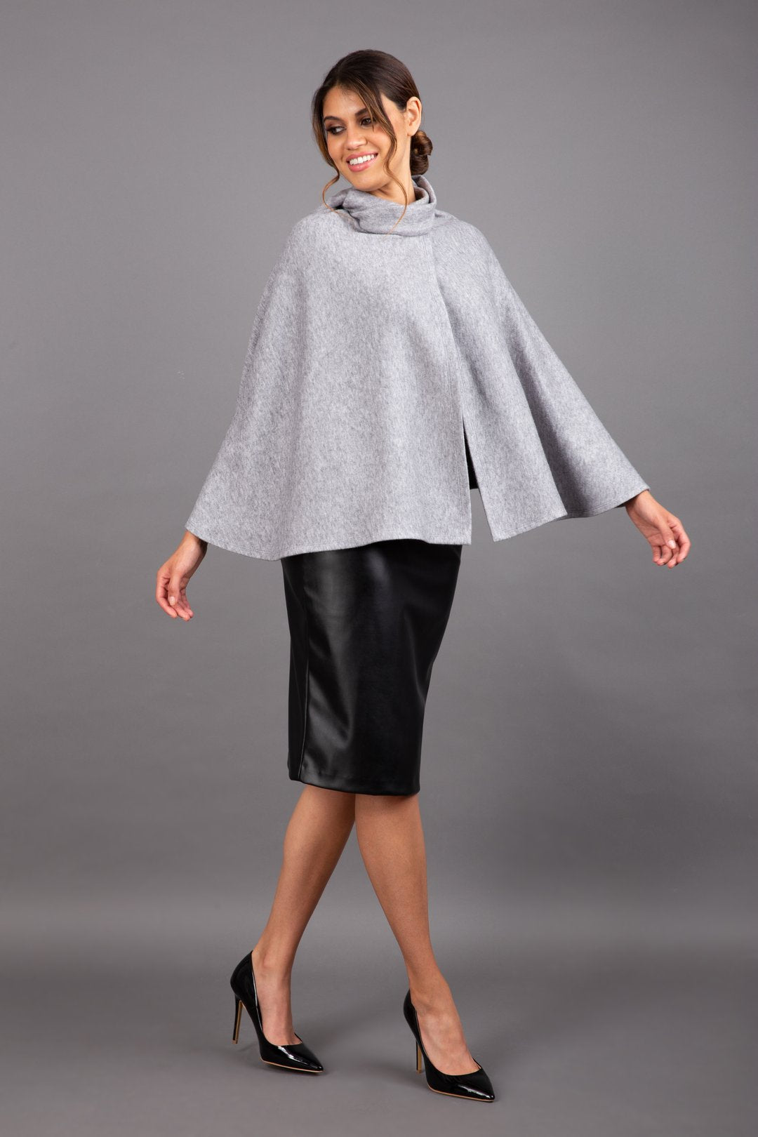 brunette model wearing diva catwalk hampstead cape known as shawl high neck in flint grey front