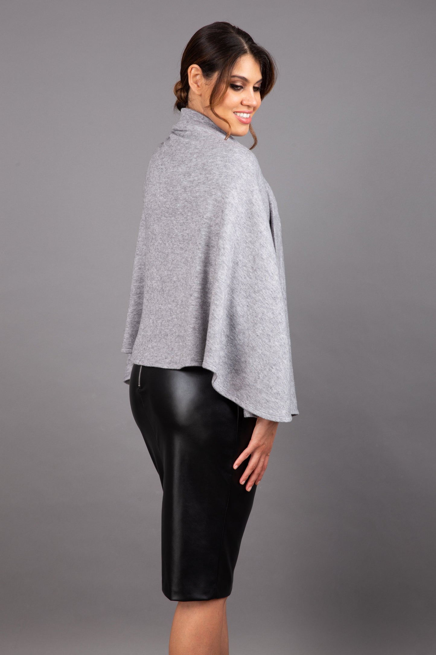 brunette model wearing diva catwalk hampstead cape known as shawl high neck in flint grey front