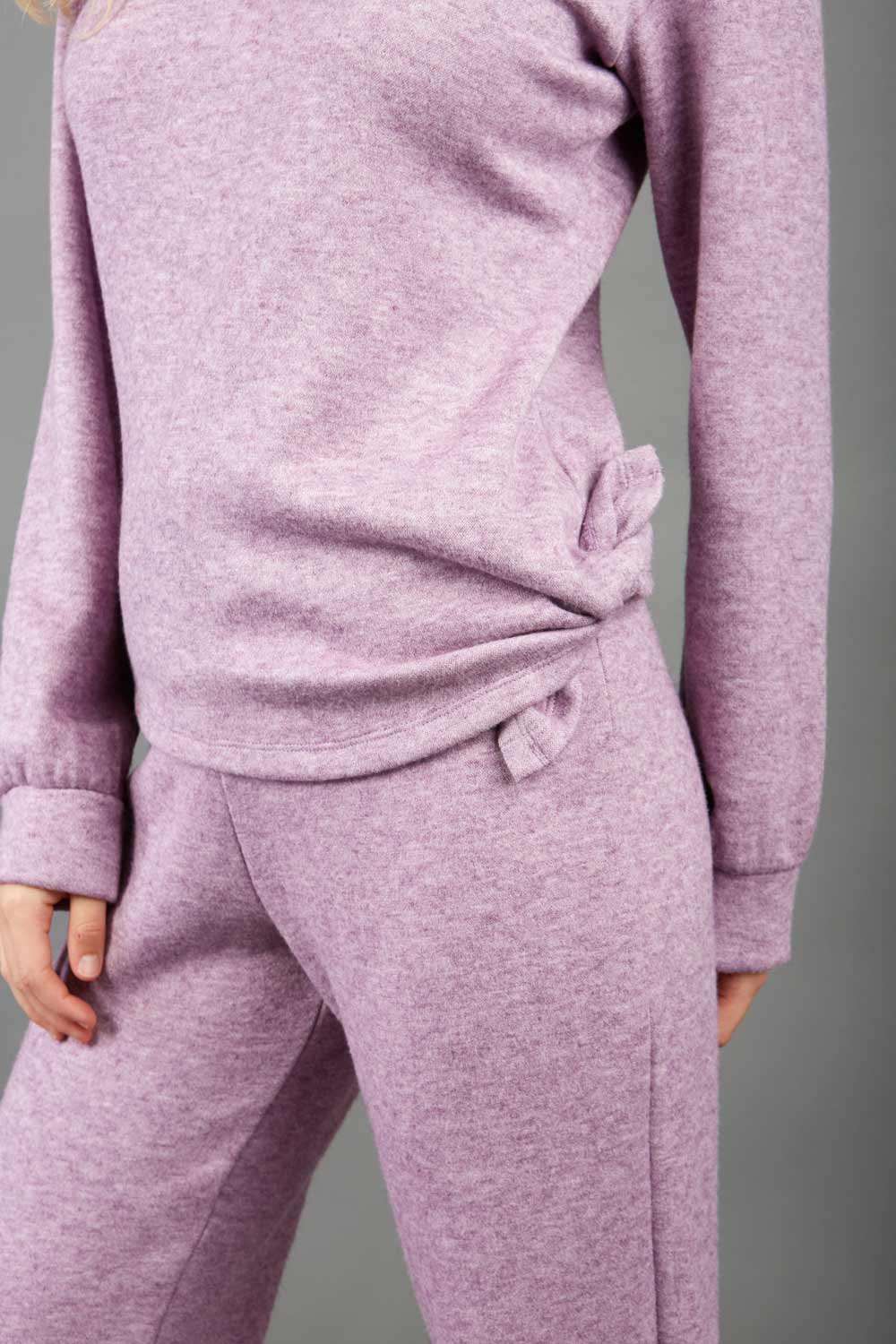 Model is wearing diva catwalk brody cashmere trousers long leg in pink colour back