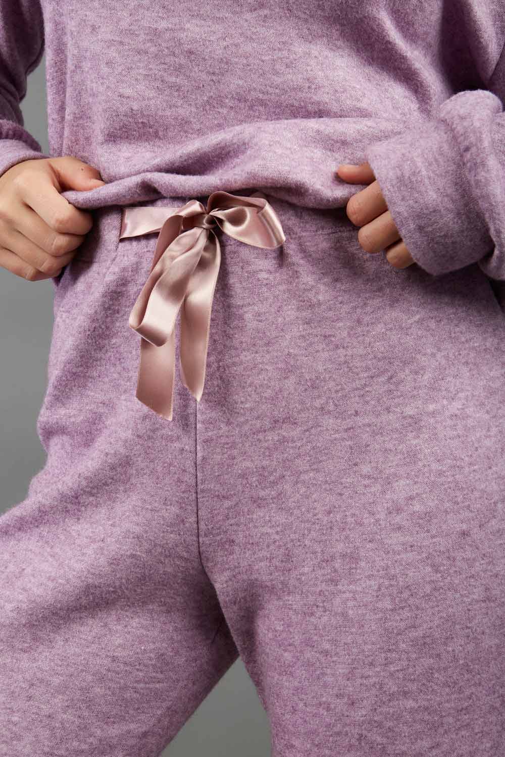 model wearing diva catwalk cosy soft touch cashmere joggers long leg with ribbon detail in lavender mist sweat pants design front