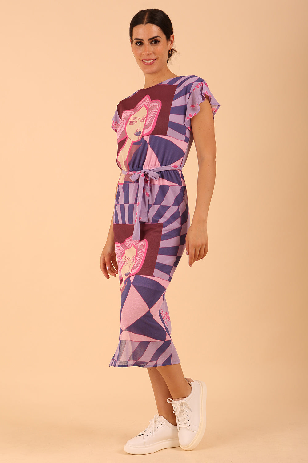 model is wearing diva catwalk midi length printed dress with short sleeves and belt detail in purple front