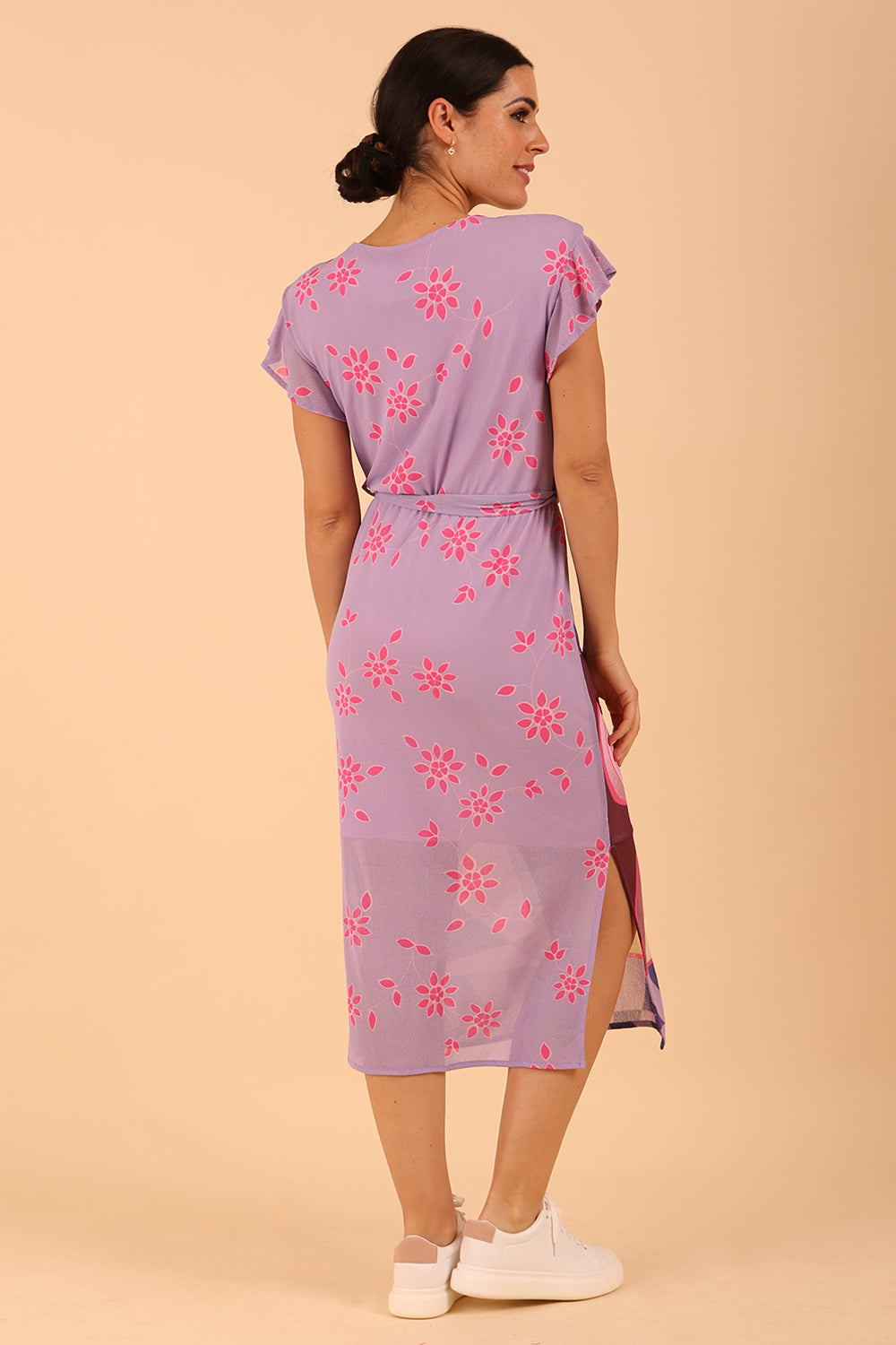 model is wearing diva catwalk midi length printed dress with short sleeves and belt detail in purple front