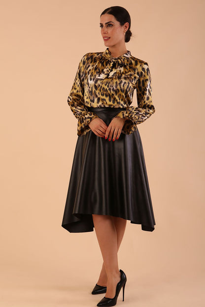 divacatwalk ricky long sleeve animal printed top with a loose tie detail at the front in gold leopard print front