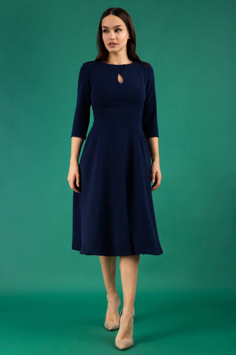  model is wearing diva catwalk casares swing dress with a keyhole neckline three quarter sleeve dress with pocket detail in navy blue front (Navy Blue)