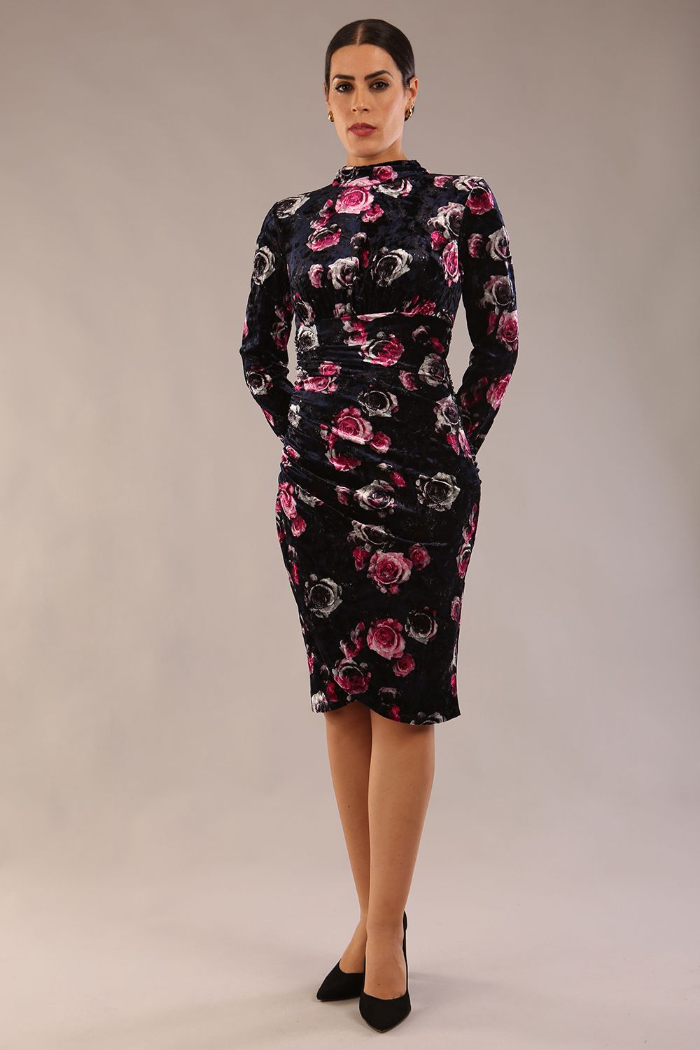 model is wearing a diva catwalk Firenze High-Neck Floral Velvet Wrap Dress long sleeves knee length with ruched sides.