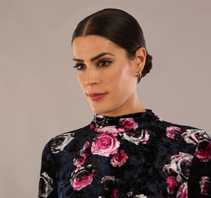 model is wearing a diva catwalk Firenze High-Neck Floral Velvet Wrap Dress long sleeves knee length with ruched sides.